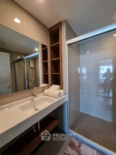 Modern bathroom with sleek design and spacious shower area