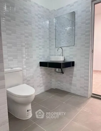 Modern bathroom with sleek fixtures and stylish tile design