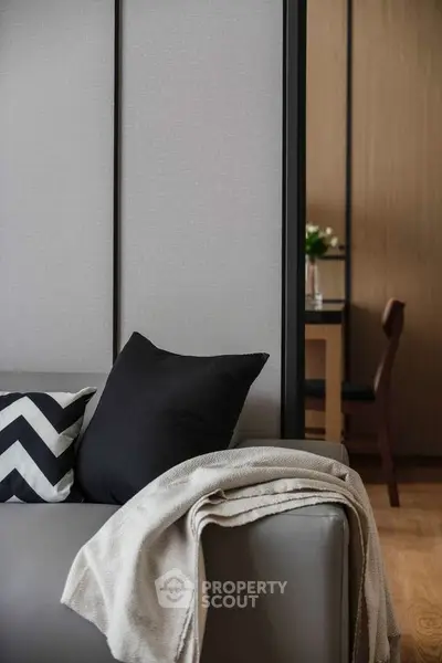 Modern living room with stylish sofa and chic decor accents