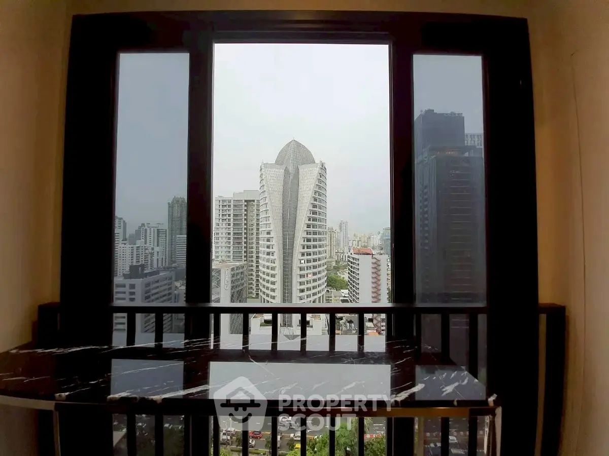 Stunning cityscape view from modern high-rise apartment window
