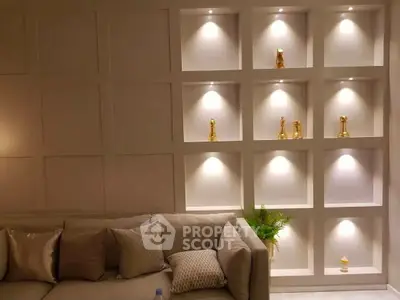 Elegant living room with modern wall shelving and ambient lighting