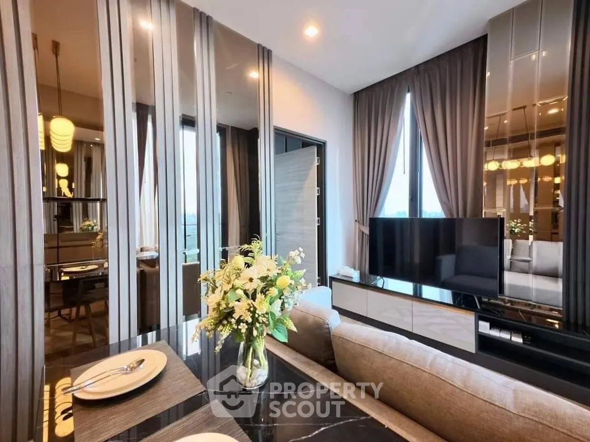 Luxurious modern living room with elegant decor and large TV