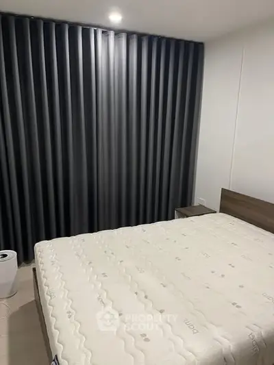 Modern bedroom with minimalist design and cozy ambiance