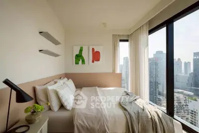 Modern bedroom with large windows offering stunning city views, featuring minimalist decor and cozy bedding.