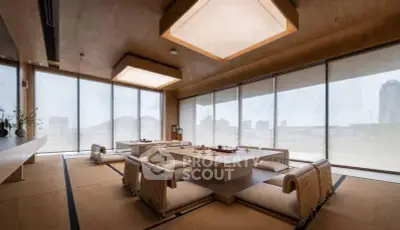 Luxurious modern living room with panoramic city views and elegant Japanese-style seating.