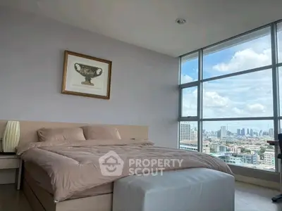 Luxurious bedroom with stunning city view and modern decor