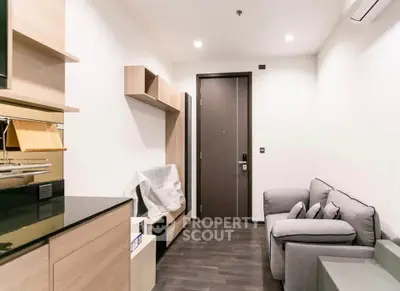 Modern apartment interior with cozy living room and stylish furniture
