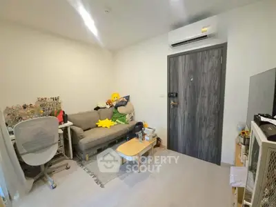Cozy study room with modern decor and air conditioning, perfect for productivity and relaxation.