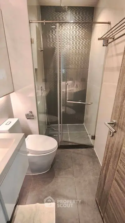 Modern bathroom with sleek shower and contemporary fixtures