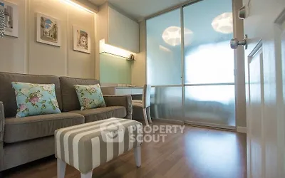 Chic modern living room with stylish decor and frosted glass sliding doors