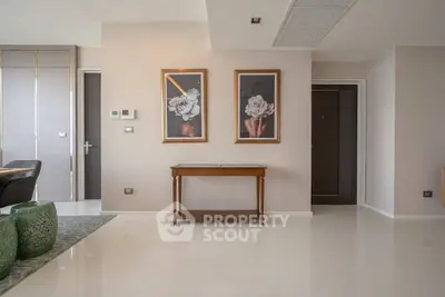 Elegant modern interior with stylish decor and sleek furniture in a spacious living area.