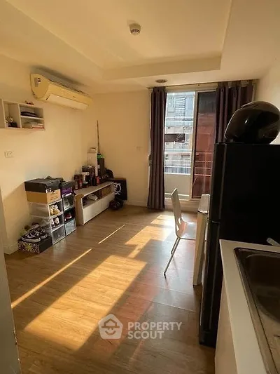Cozy apartment interior with wooden flooring and natural light