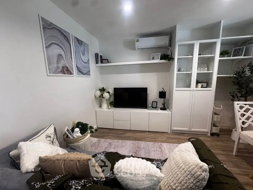Cozy living room with modern decor and stylish shelving unit