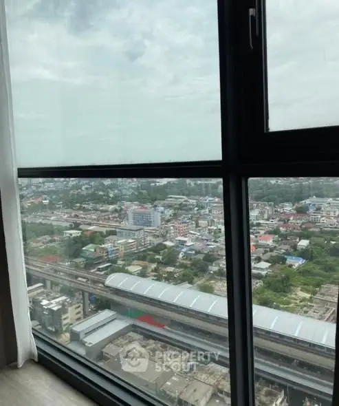 Stunning cityscape view from high-rise apartment window