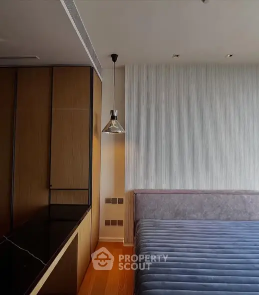 Modern bedroom with sleek design and stylish lighting