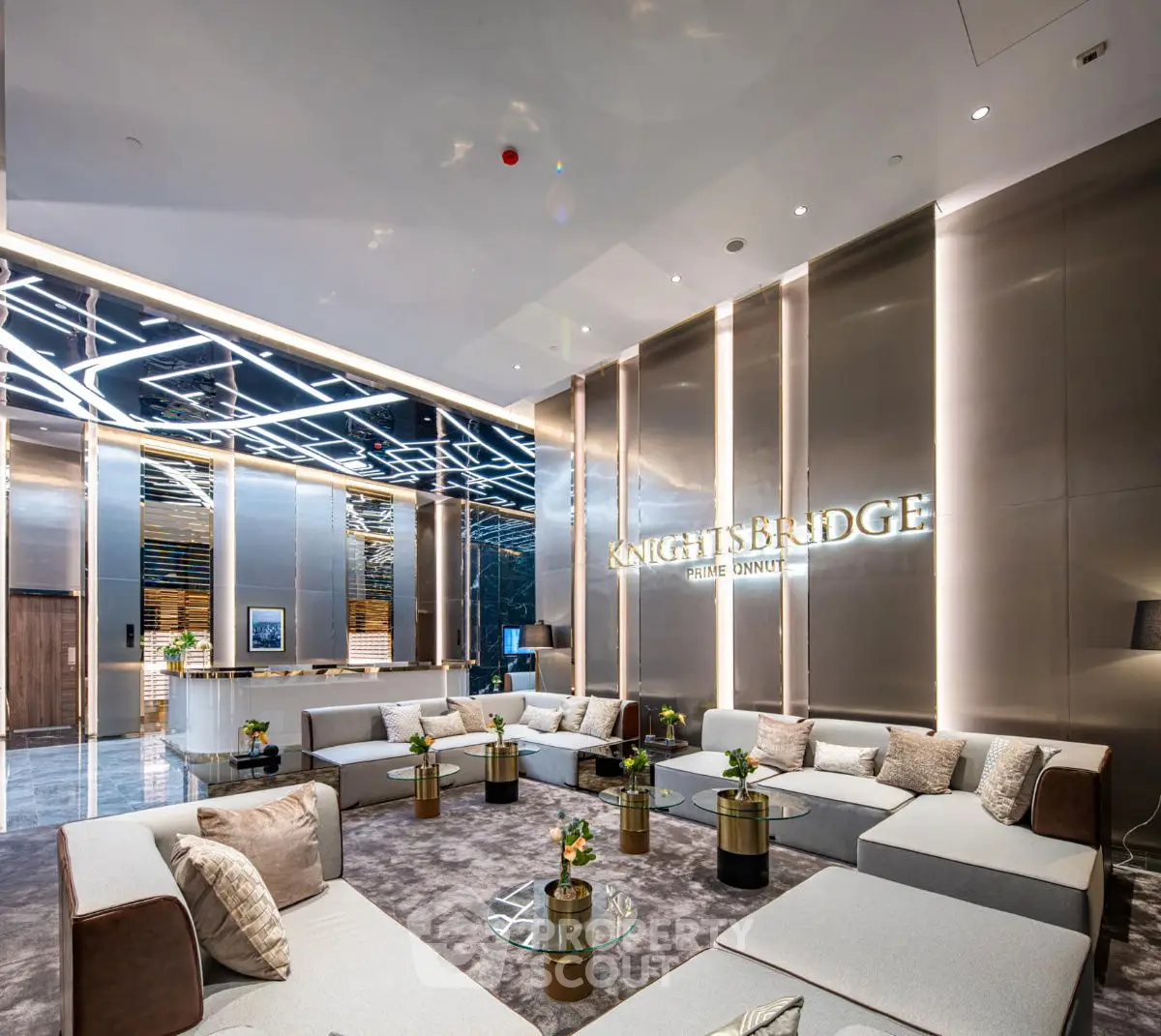 Luxurious modern living room with sleek design and ample seating in Knightsbridge Prime Onnut.