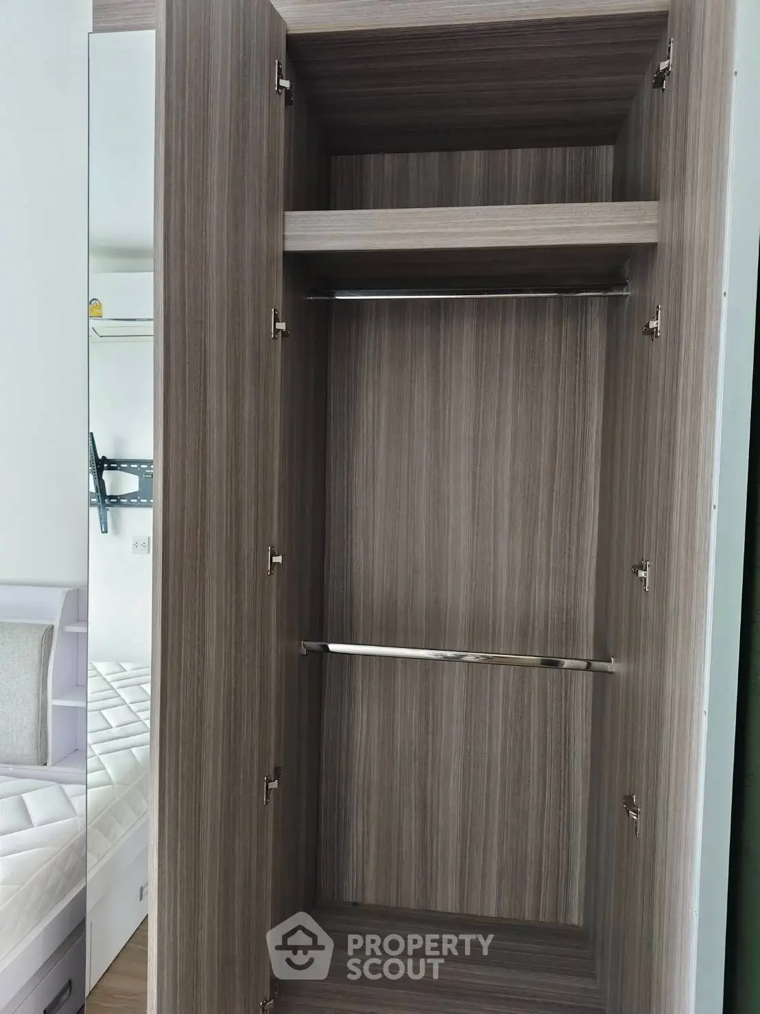Spacious modern wardrobe in a stylish bedroom setting