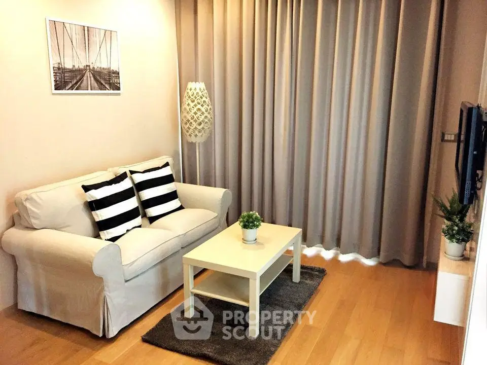 Cozy living room with stylish decor and natural light