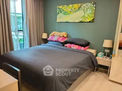 Cozy bedroom with modern decor and large window view