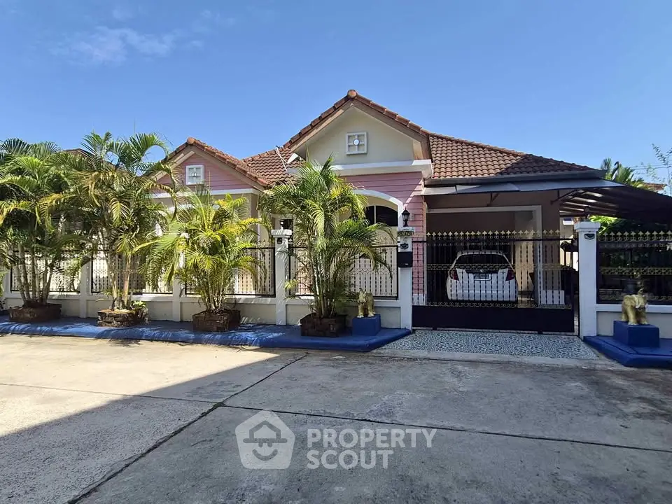 Charming suburban home with lush greenery and spacious driveway