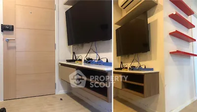 Modern living room with wall-mounted TV and red shelves