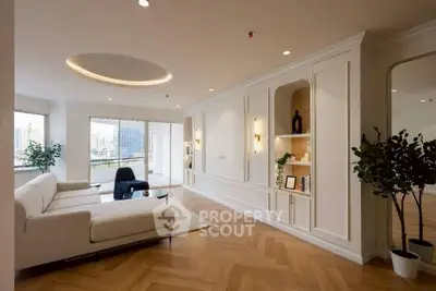 Spacious modern living room with elegant design and large windows offering city views.