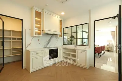 Elegant kitchen with open layout and modern appliances in a luxury home