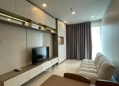 Modern living room with sleek furniture and natural light