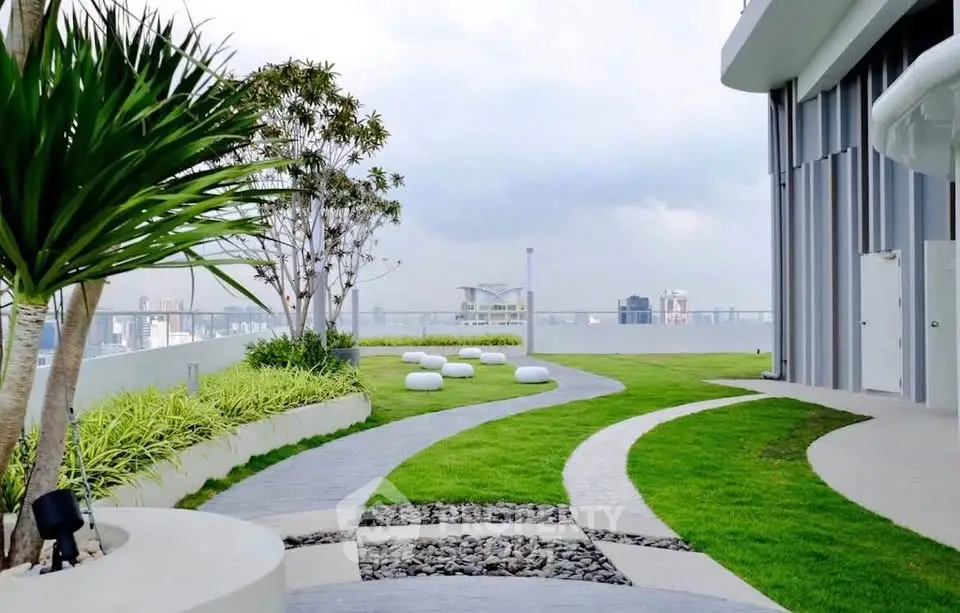 Stunning rooftop garden with modern landscaping and city views, perfect for relaxation and entertainment.
