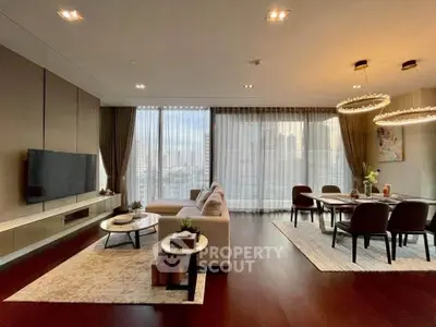 Luxurious modern living room with elegant dining area and stunning city view.