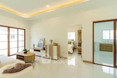 Spacious modern living room with elegant decor and natural light