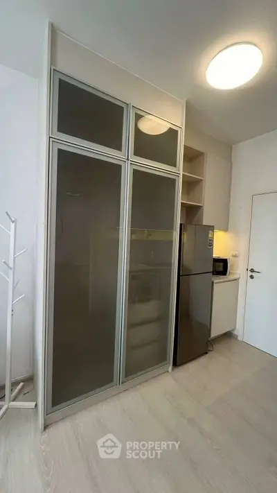 Modern kitchen with sleek appliances and ample storage space