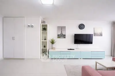 Modern living room with sleek TV unit and stylish decor