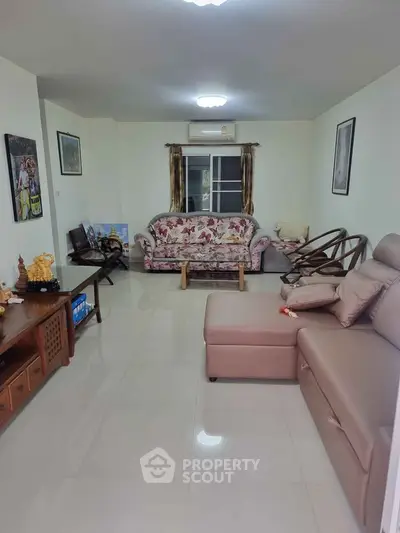 Spacious living room with stylish furniture and elegant decor