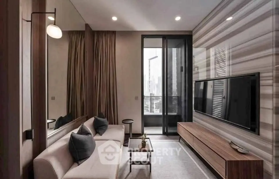 Modern living room with sleek design, featuring a large TV, stylish sofa, and floor-to-ceiling windows with city view.