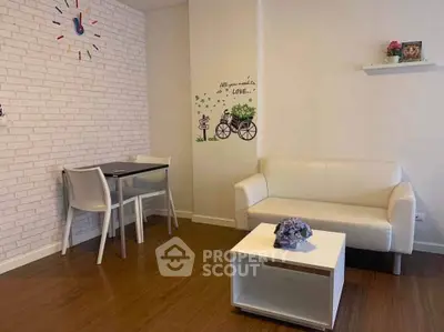 Charming living room with modern decor and cozy seating area.