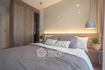 Modern bedroom with stylish decor and cozy lighting