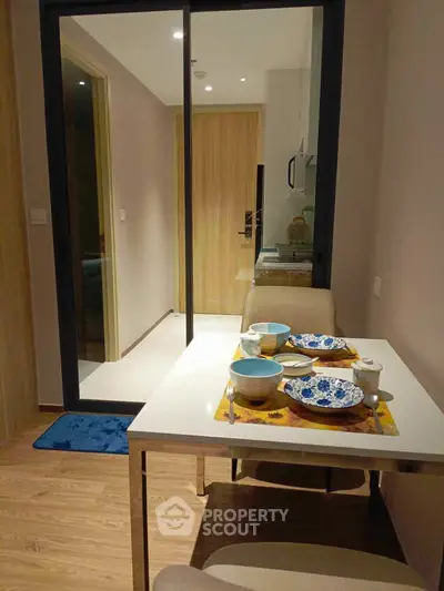 Cozy dining area with modern table setting in a stylish apartment