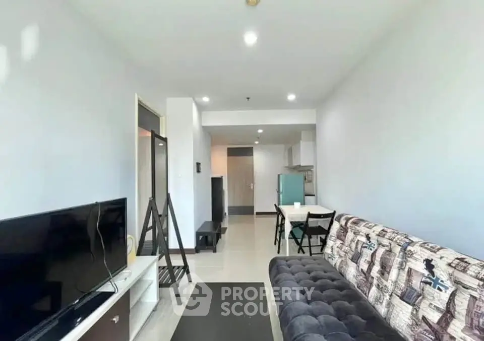 Modern living room with stylish decor and open kitchen layout