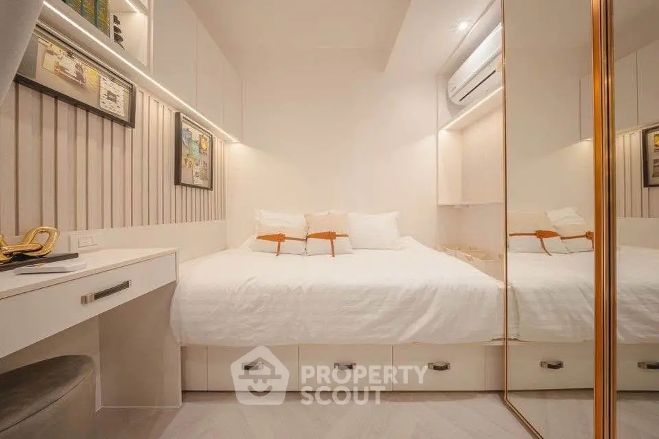 Modern bedroom with stylish decor and built-in storage solutions