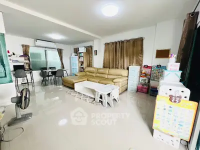 Spacious modern living room with leather sofa and sleek decor