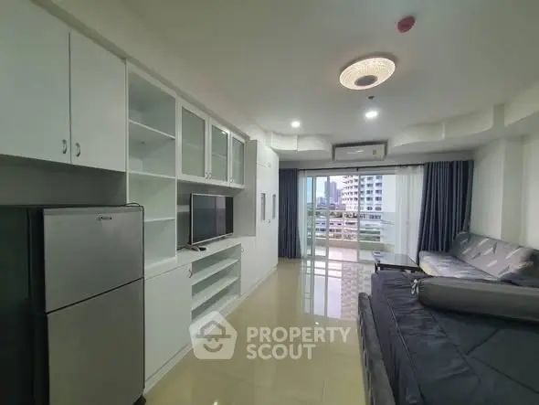 Modern living room with balcony view in urban apartment