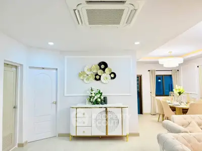 Elegant living and dining area with modern decor and stylish furniture