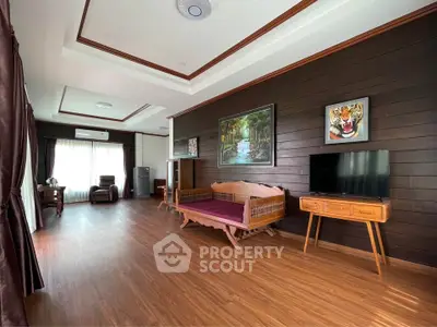 Spacious living room with wooden accents and modern decor