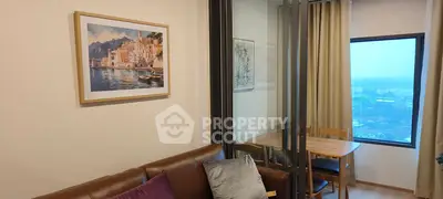Modern living room with glass partition and scenic view