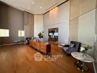 Luxurious modern living room with high ceilings and elegant decor