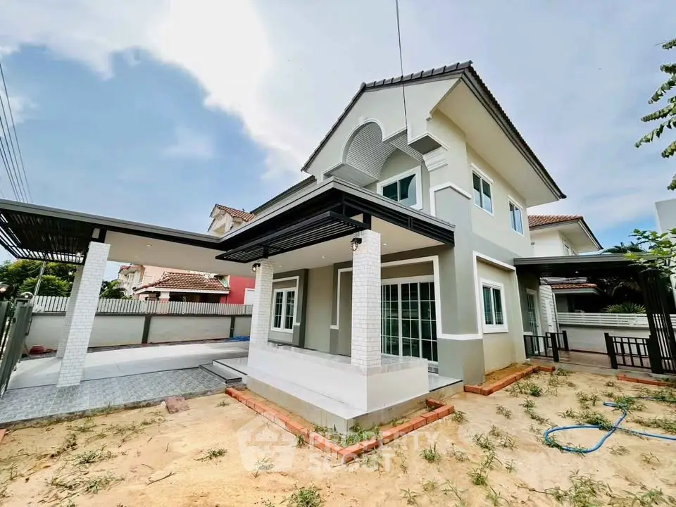 Stunning two-story modern house with spacious outdoor area and elegant design.