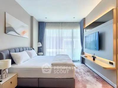 Luxurious modern bedroom with large windows and stylish decor