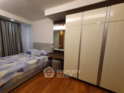 Modern bedroom with stylish decor and spacious wardrobe