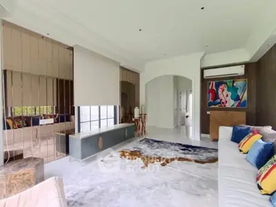 Luxurious living room with modern decor and vibrant artwork